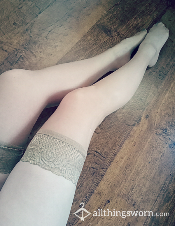Well-worn, Flesh-coloured 15 Denier Hold Ups With A Small Ladder In The Right Leg. Worn Many Times Without Being Washed And Can Be Worn For Extra Time