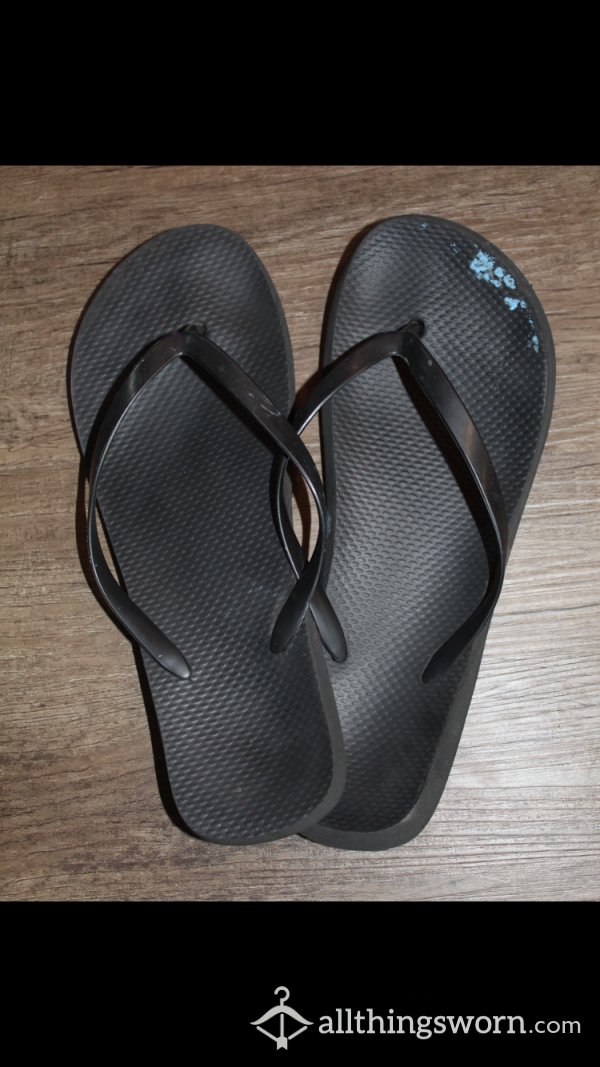 Well Worn Flip Flops With Toe Indents