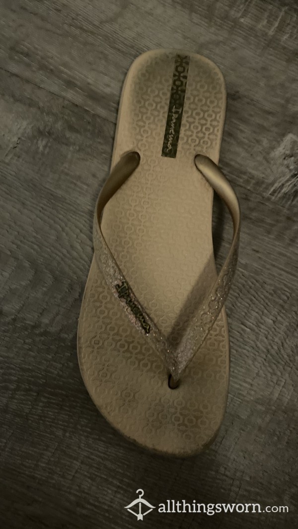 Well Worn Flip Flops With Toe Marks