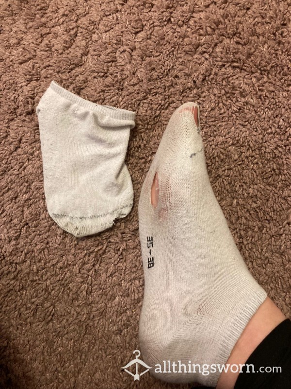Well-worn Socks With Holes