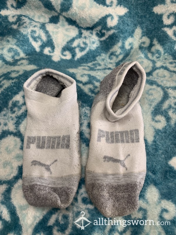 Well Worn Very Dirty White And Gray Ankle Puma Socks