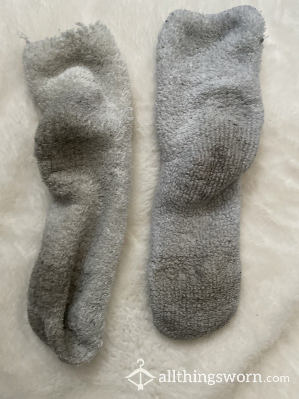 White Fluffy Winter Socks That Are Very Dirty