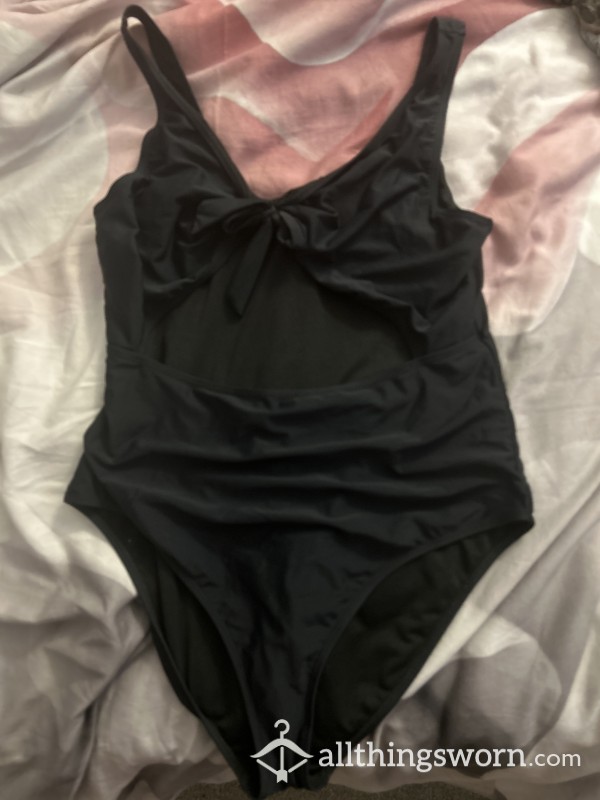 Worn Black Swimsuit