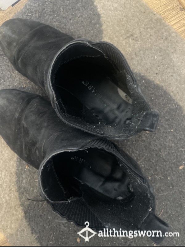 Worn Down Black Boots