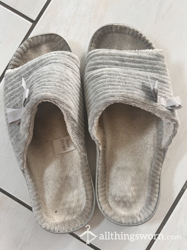 Worn, Indented And Dirty Slippers