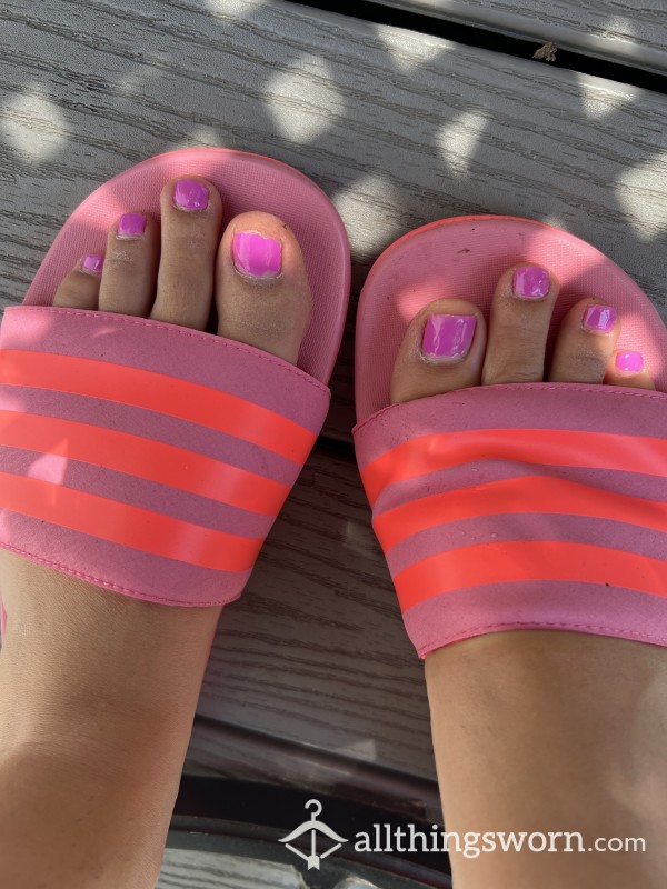 Worn Pink Adidas Slides With Dry Toes
