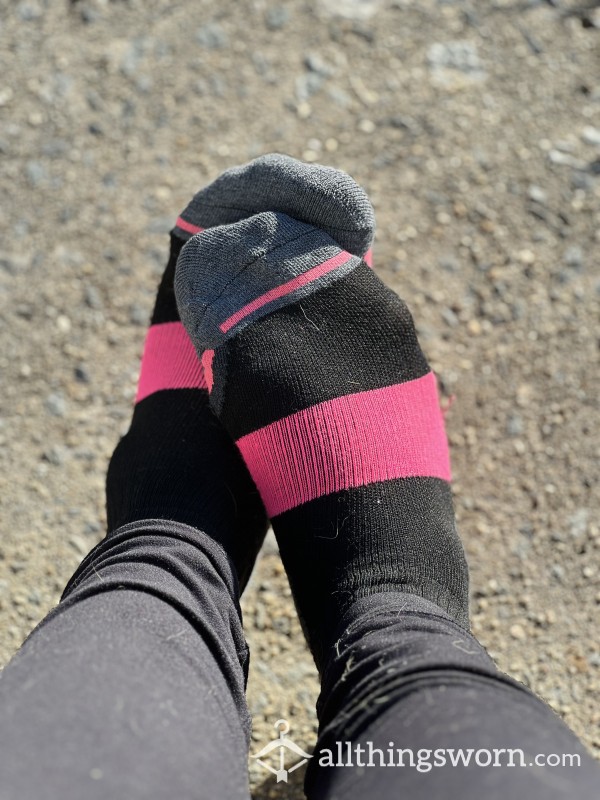 Worn Pink And Black Socks