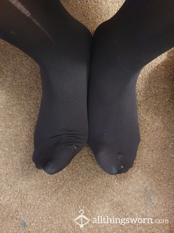 Worn Tights With Rip Down The Leg