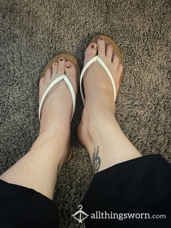 Worn White And Tan Sandal Size 10