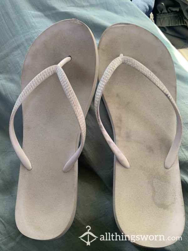 Worn White Flip Flops, Worn Practically Everywhere